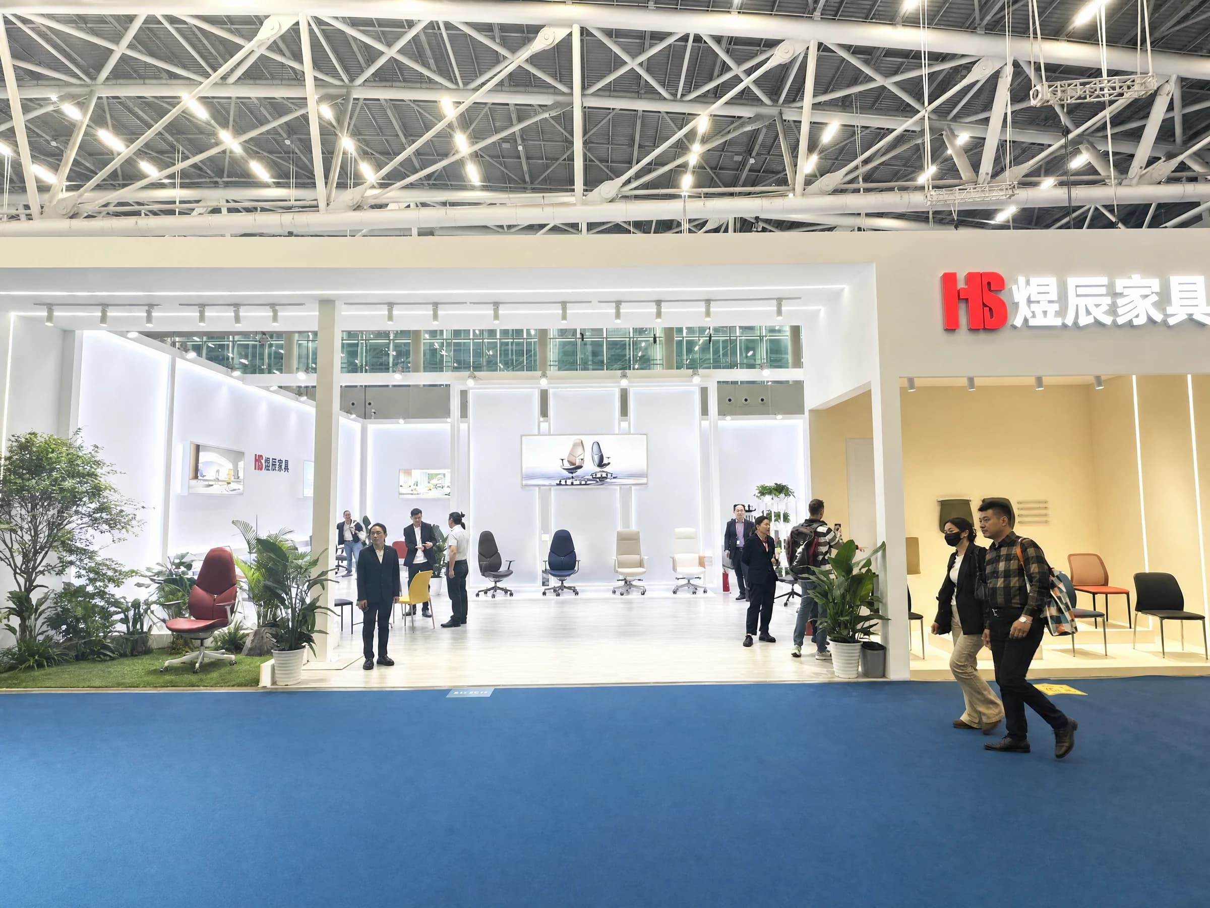 Executive chairs displayed among greenery at CIFF Guangzhou 2026
