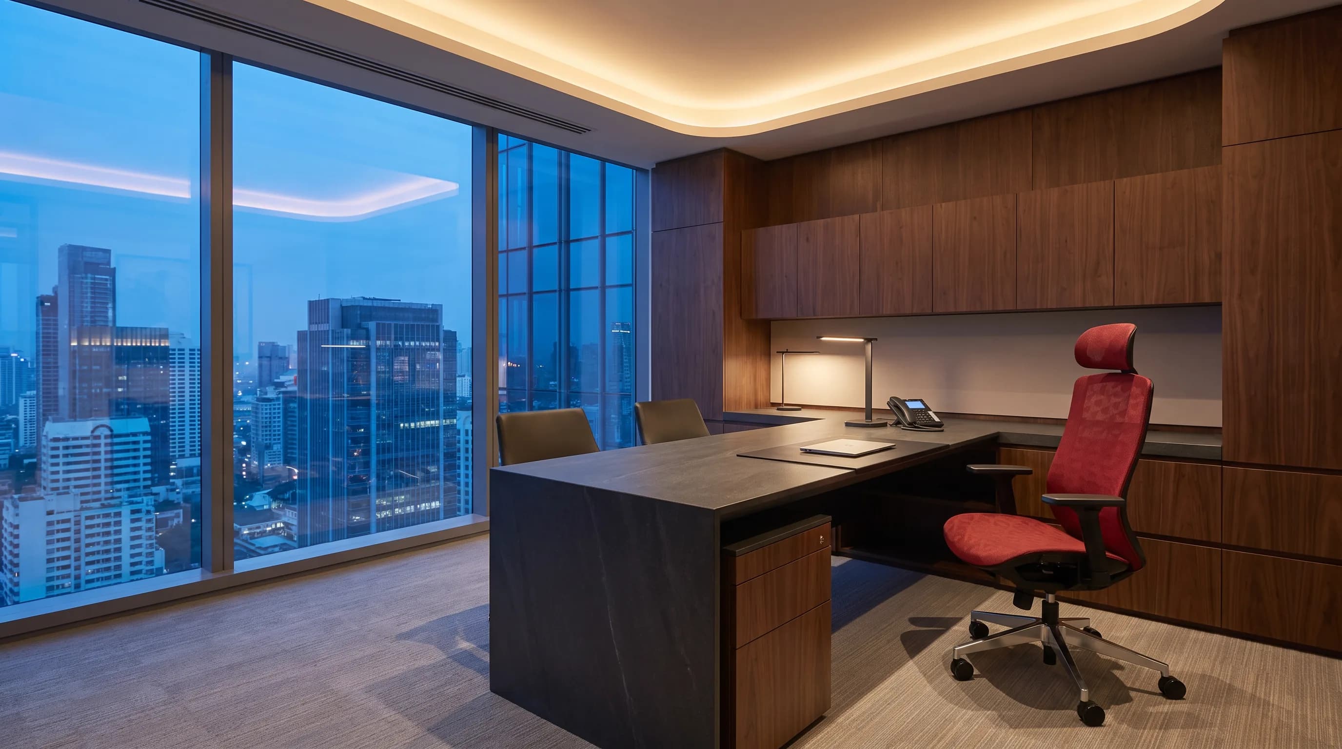Headrest-equipped Evon task chair at an executive desk with integrated storage