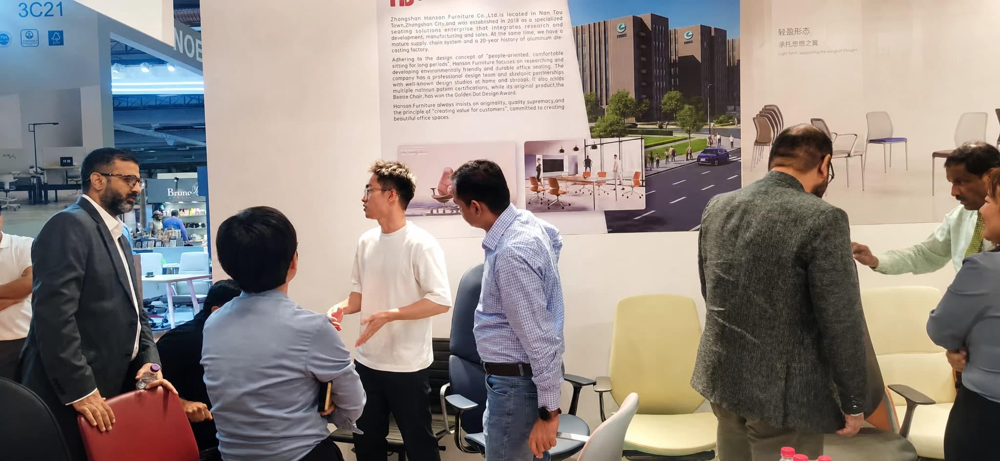 Regional buyers in discussion at the Hanson Furniture booth